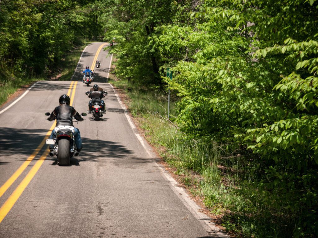Group ride through country roads.